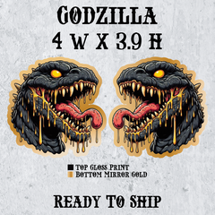 Pair of custom Godzilla car badges with dripping molten gold design, black gloss top layer, and mirror gold backing — 4 inches wide by 3.9 inches high, ready to ship from The Louver Labs.