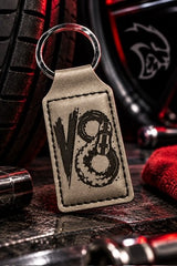 Engraved leather car keychain close-up, Built Not Bought V8 design