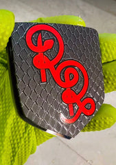 06-10 Front bumper Badge
